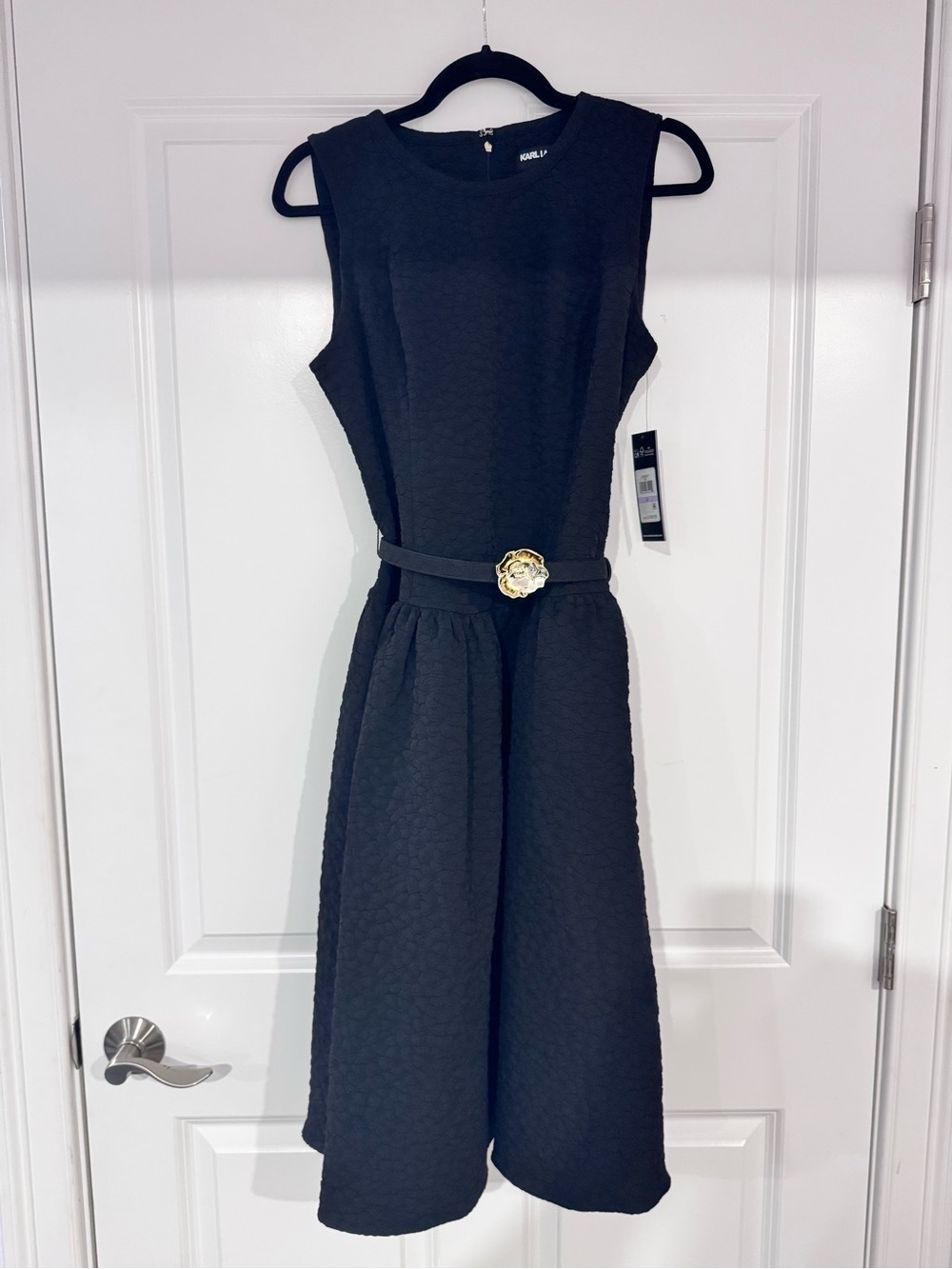 Black Sleeveless Fit-and-Flare Dress with Decorative Belt